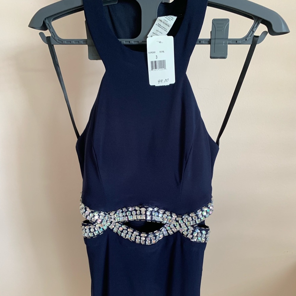 Navy halter mini dress with cut outs and bling